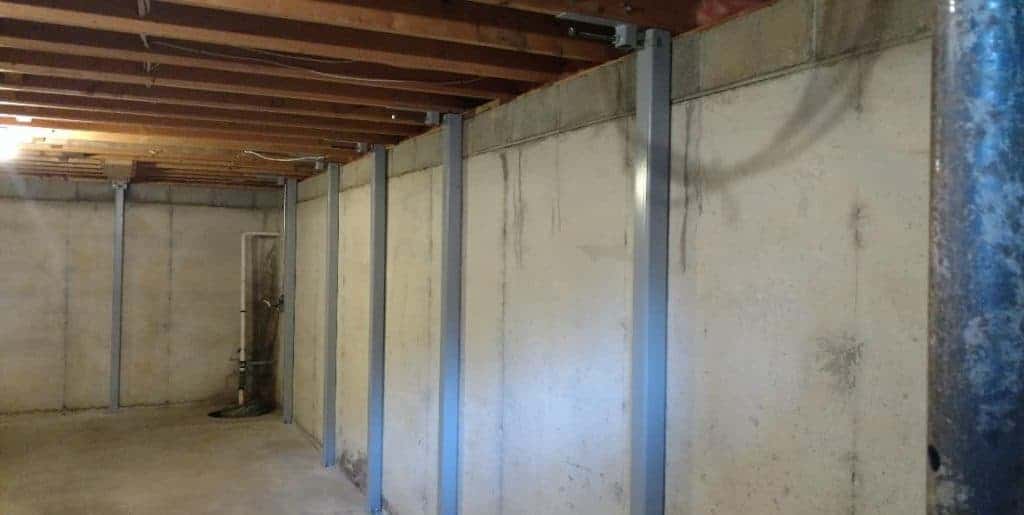 Bowing basement walls are very common in Ohio due to the clay soil conditions. Clay soil contrasts when it's dry and expands when it's wet, the more rain the wetter the soil, the more the soil will expand eventually the basement walls will bow, tilt and break.